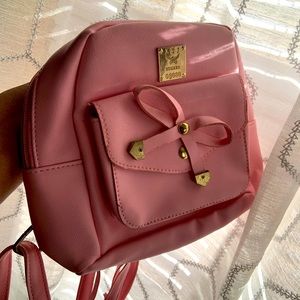 Pink mini bag.